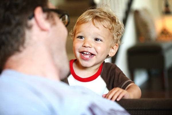 Toddler smiling.