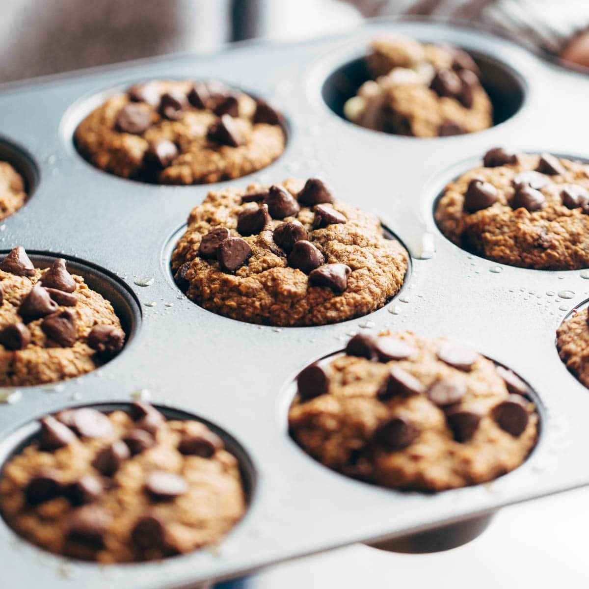 Healthy banana muffins in a muffin tin.