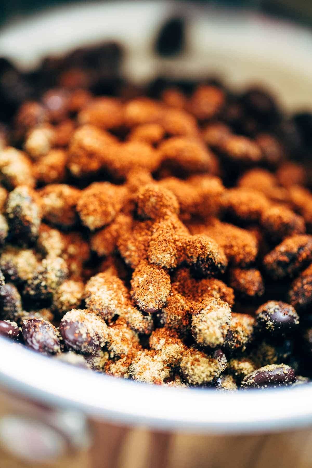 Spicy Brazilian Burrito Bowls recipe featuring seasoned rice and beans, garlic cilantro lime slaw, and crispy fried plantains. So good // almost vegan. | pinchofyum.com