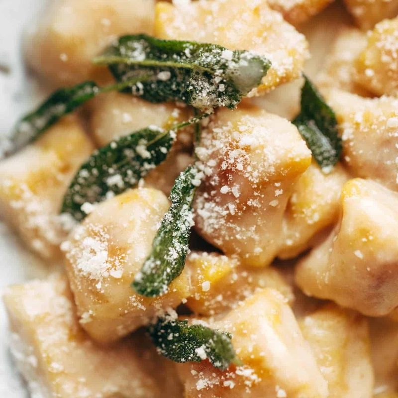 Pumpkin Gnocchi with Sage Butter Sauce on a plate.