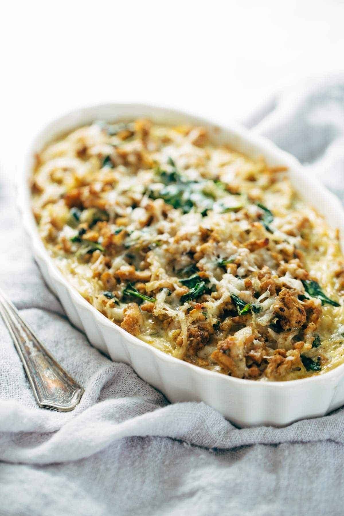 Breakfast Casserole with sausage, eggs, potatoes, spinach, and cheese! Super easy recipe that's ready in 30 minutes and high in protein. | pinchofyum.com