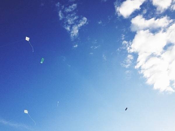 A kite against a blue sky.