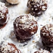 Dark Chocolate Coconut Bites with coconut sprinkled on.