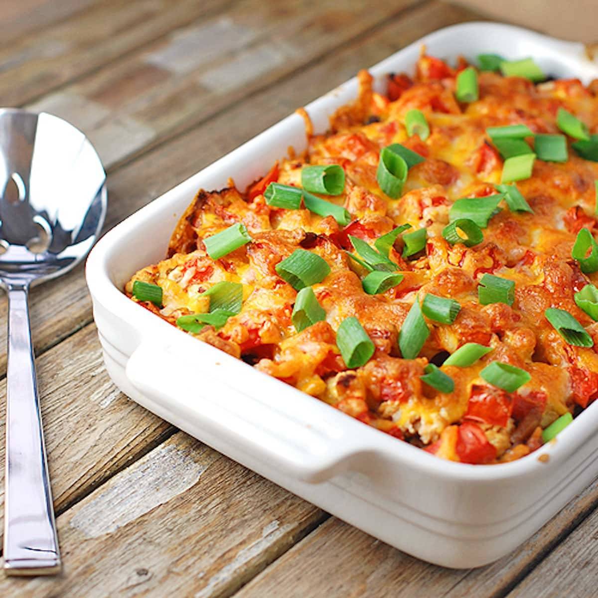 Black bean casserole with ground turkey, black beans, peppers, and cheese. 