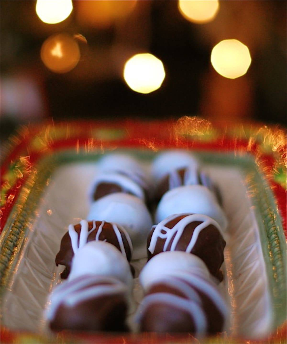 Minty Chocolate Oreo Truffles in a decorative tin pan.