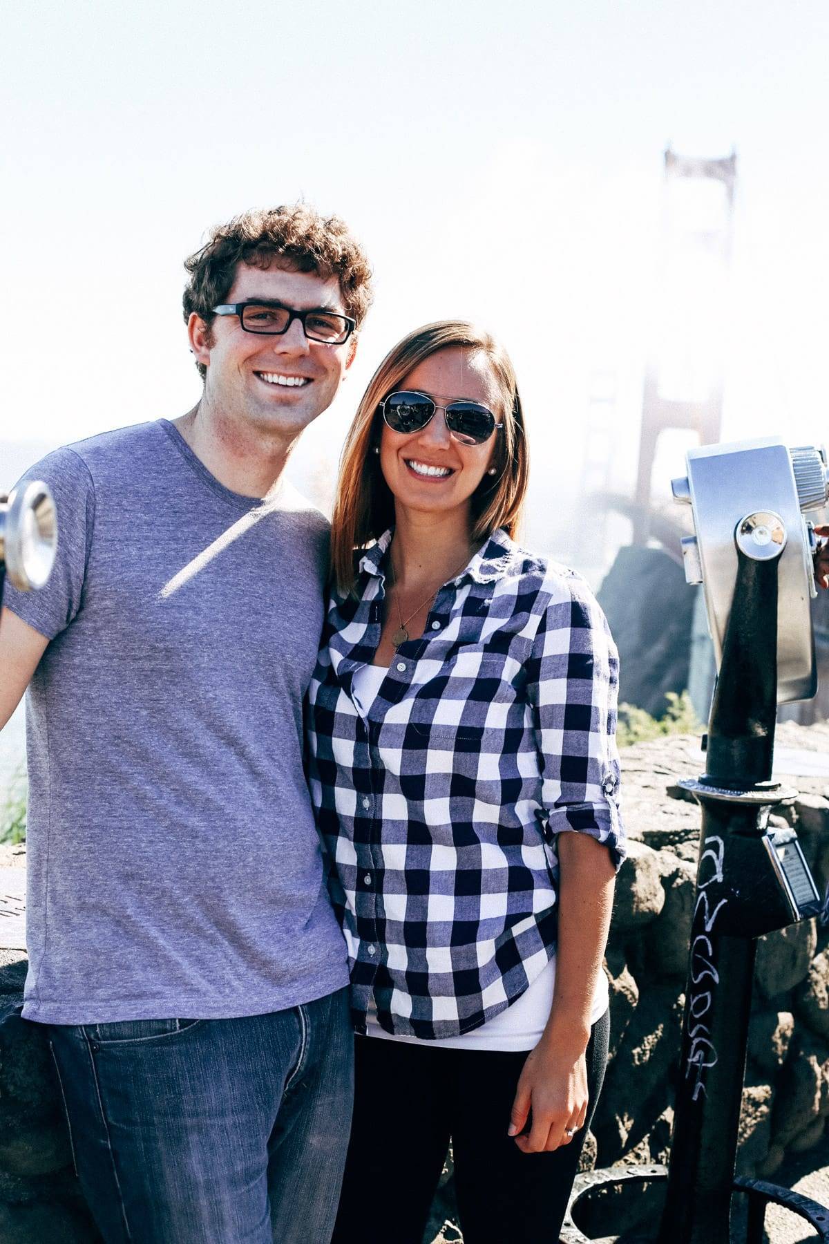 Man and woman smiling.